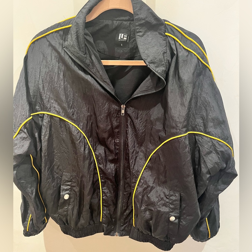 Black bomber jacket with yellow seems